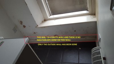 This is front of property inside wall where salts and massive amount of damp is coming up the wall. The damp proof company has only injected from the outside and I cant understand that the hole depth I checked they drilled was only 11cm from outside wall yet the whole cavity wall thickness is 52cm