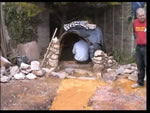 Laying stone to form the cave