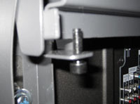 Bottom guide bracket of TV screwing up into bottom runner 