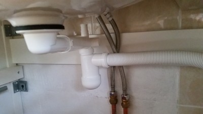 Pic shows little room to add any other plumbing devices.