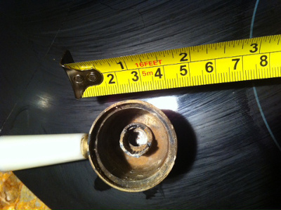 The inside of the lever, where you can see the inside cog has broken in half.
