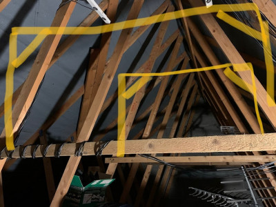 Picture showing fink trusses and central brace, with possible floating replacement brace higher up