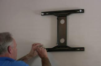 Fitting a heavy TV bracket is easy with Corefix fixings