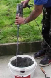 Using a mixer paddle to mix epoxy mortar