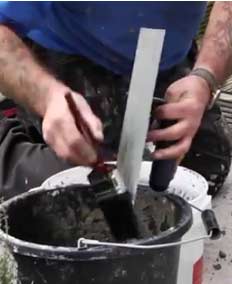 Cleaning a finishing trowel with Safer Solvent