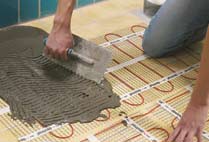 Electric underfloor heating can be applied to the top of a screeded floor