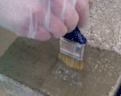 Tanking slurry for waterproofing walls and floors