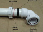 An assembled compression waste fitting