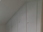 Sloping ceiling built-in wardrobe