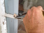 How to Use a Chopping Knife to Chop Out Putty and Remove Glass from a Window