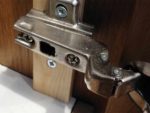 Concealed cabinet door hinge