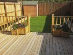 New fencing and decking in a garden