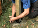 Fixing Fence Posts and Using Metal Post Holders for Securing Fencing