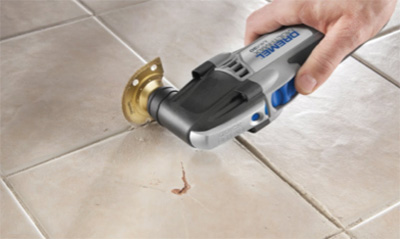 A multi function tool removing grout