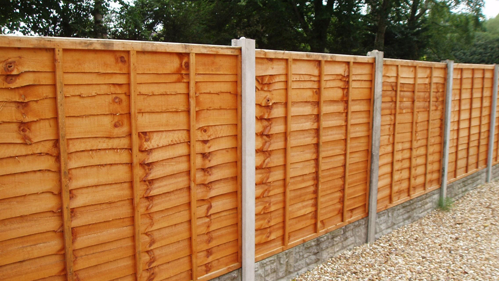 How To Install A Panel Fence Diy Doctor, How To Put Up Wooden Fence Panels
