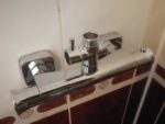 Thermostatic shower mixer valve