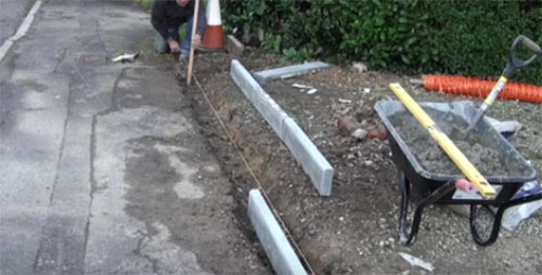 Dig out trench and ensure base is flat and smooth