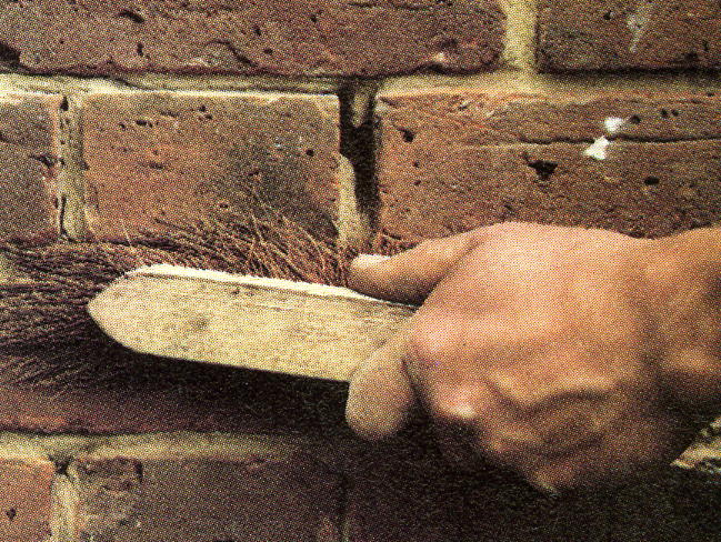 Clean off any remaining loose mortar using a wire brush