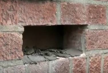 Mortar applied to base of hole