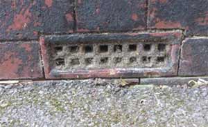 Debris and leaves can build up inside the air brick blocking air flow and causing damp conditions