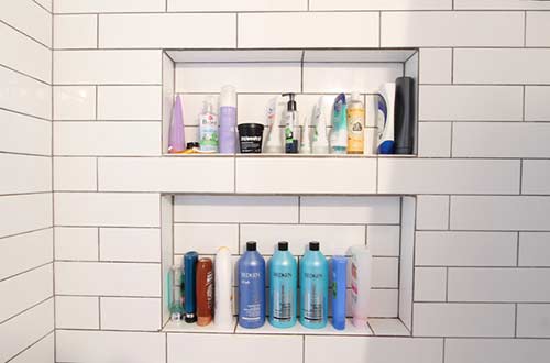 Alcove shampoo storage area