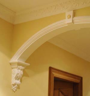 Corbel moulding around archway