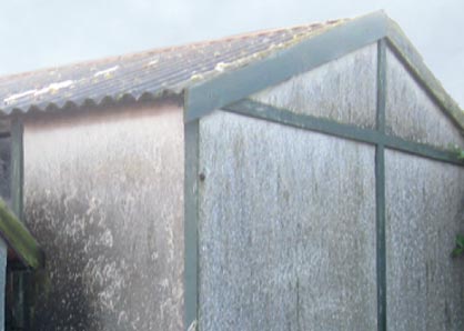 Outhouse with asbestos roof