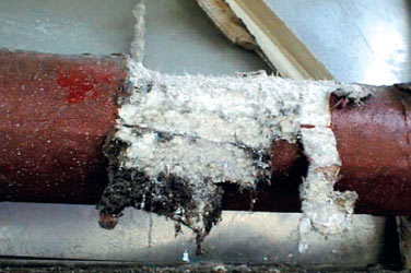 Pipe lagging with asbestos