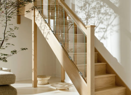 Wooden staircase and glass panelling