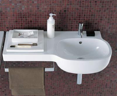 Asymmetrical basin in bathroom