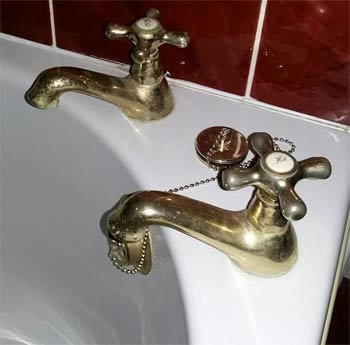 Brass effect bath taps