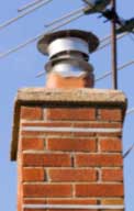 Chimney with flue poking out the top