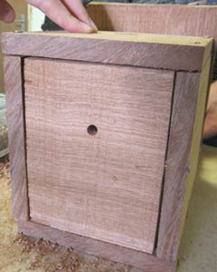 Drainage hole drilled into base of bird box