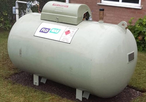 LPG gas tank installed in garden to supply property