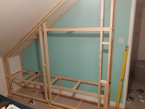 Fitted wardrobe frame installed