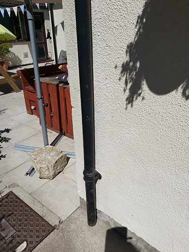 Traditional cast iron guttering down pipe