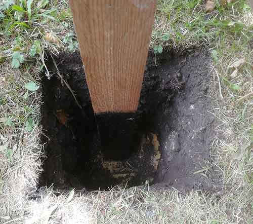Fence post holes dug