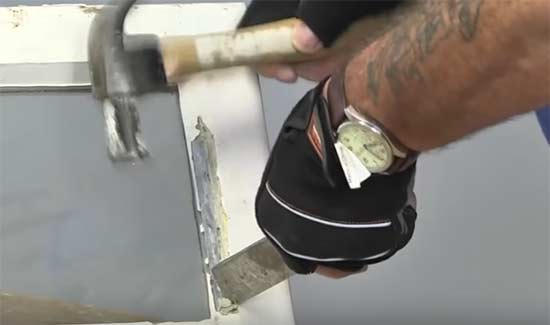 Get hacking knife right down into the corners to remove window putty