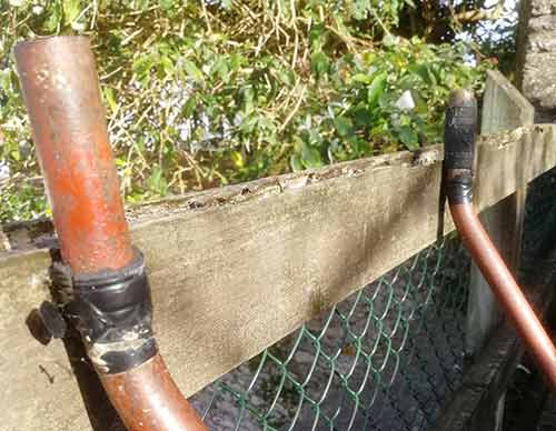 Damaged and unprotected wheelbarrow handles