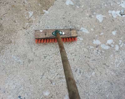 Brush washing a patio