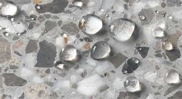 Water balling up on a sealed stone surface