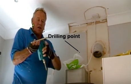 Core drilling point marked on wall