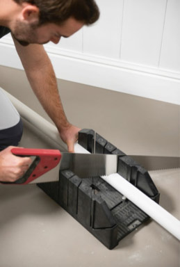 Cutting coving with a mitre block for an accurate corner