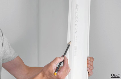 Measuring coving for a left hand external mitre