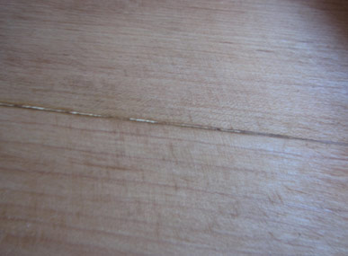 Repairing timber cracks and splits with two part filler