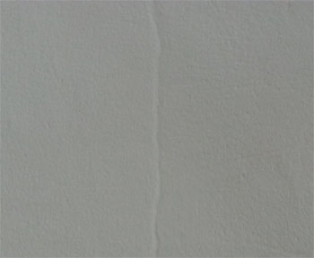 Filling fine, surface cracks in plaster and paint