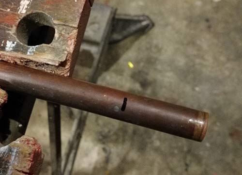 Copper pipe clamped up for cutting
