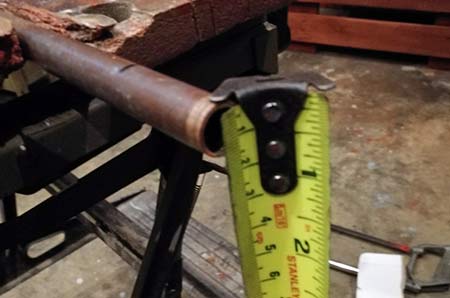 Measure diameter of copper pipe to select correct sized pipe slice