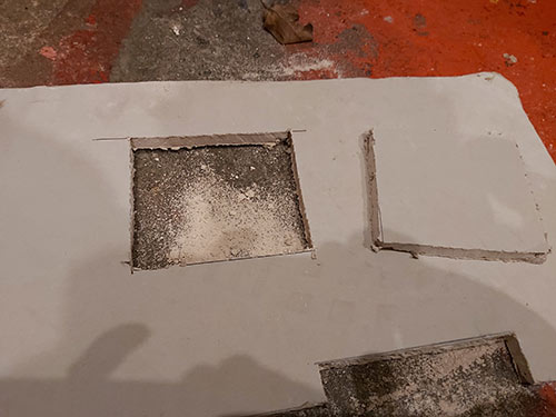 Hole cut out of plasterboard using stab saw