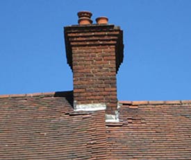 Broken roof tiles can allow damp into your roof timbers